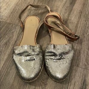 Stuart WeitzmanSilver sequin sandals.